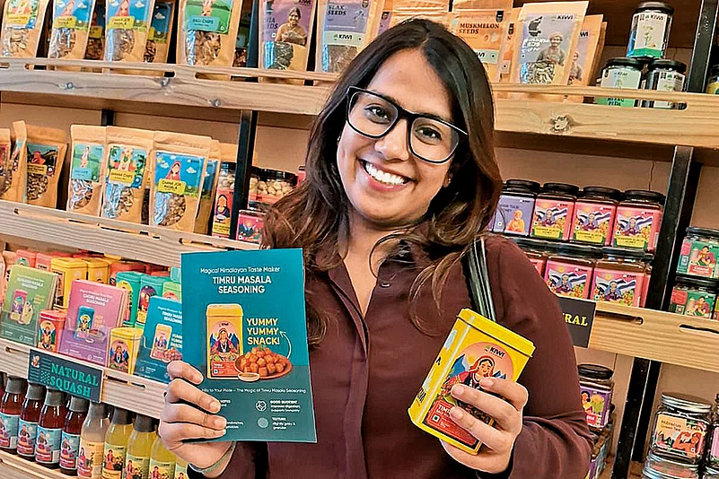 A customer selects items at a Kiwi Kisan Window store