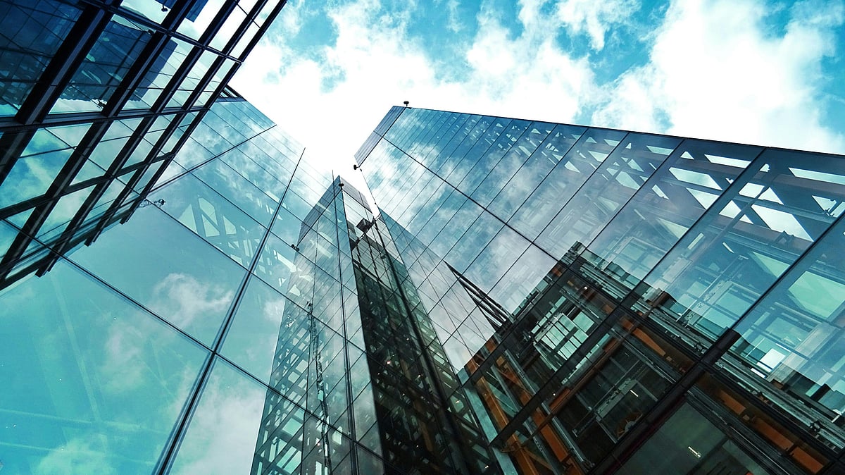 Photo by SevenStorm JUHASZIMRUS : Global businesses adapt as climate change drives rising costs and operational challenges.