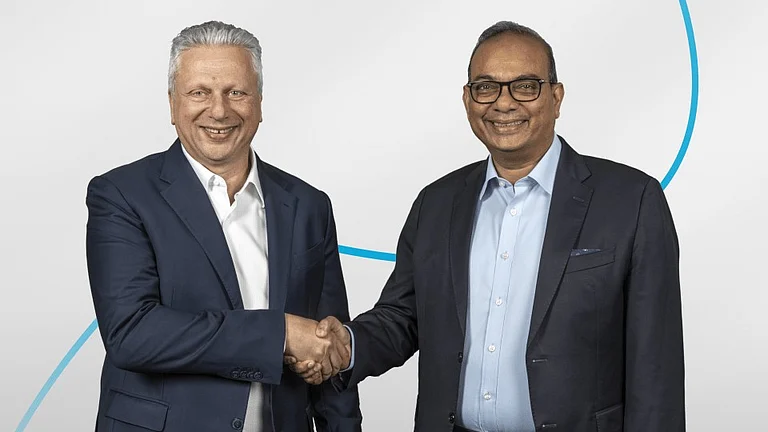 Aiman Ezzat, CEO of Capgemini , and Keshav R. Murugesh, CEO of WNS - null