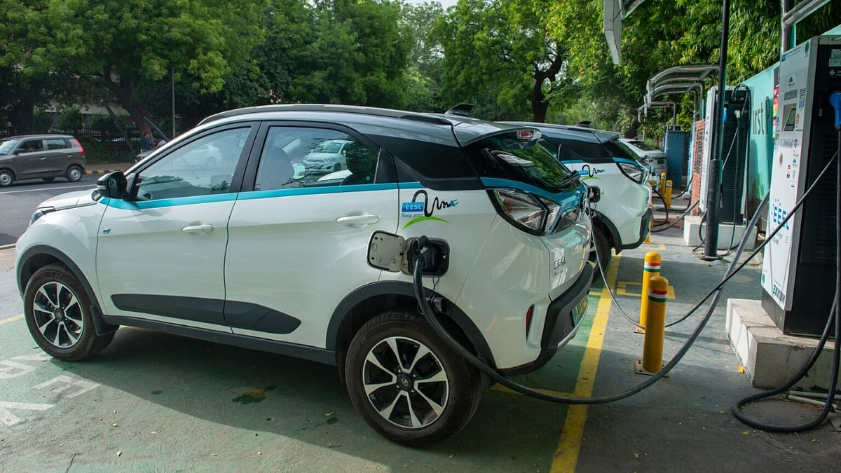 Electric Vehicle charging at a charging station in New Delhi - null
