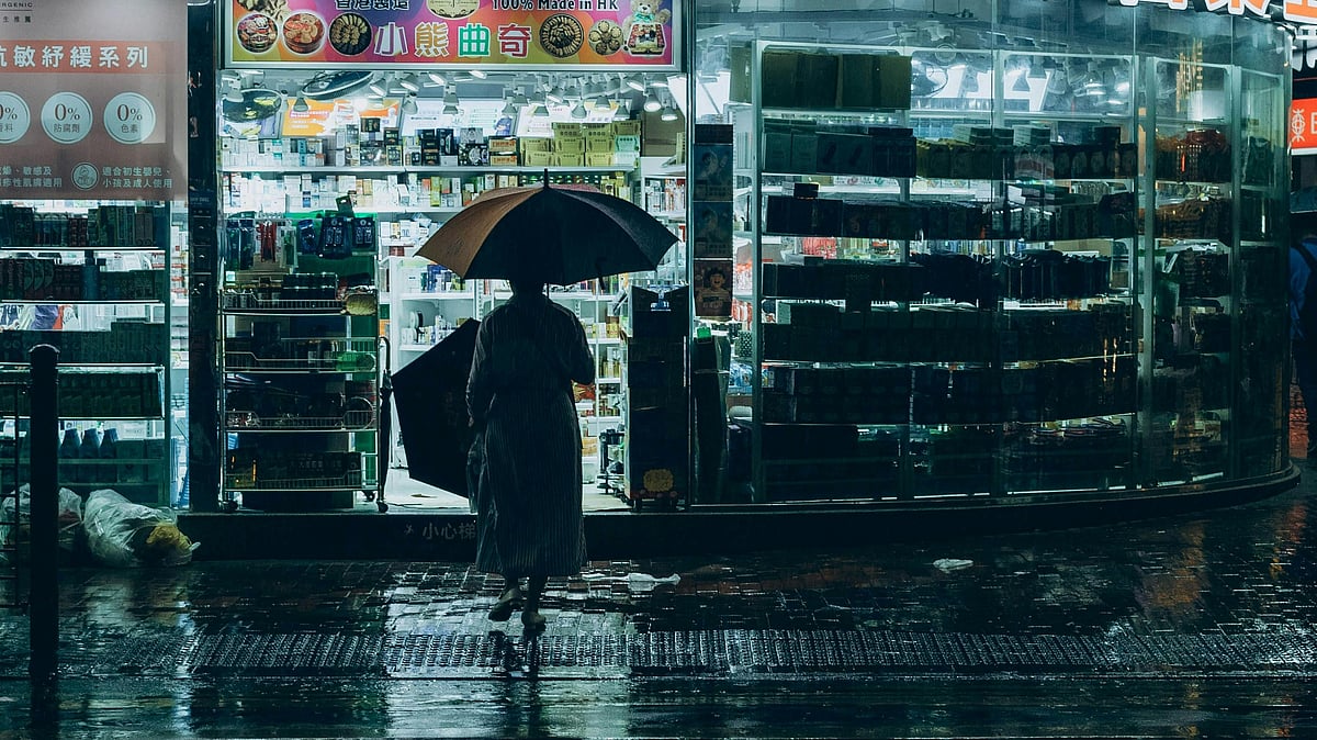 Photo by Margarita Kainova : Torrential rain floods streets in Hong Kong as black rain warning disrupts daily life and travel across the city