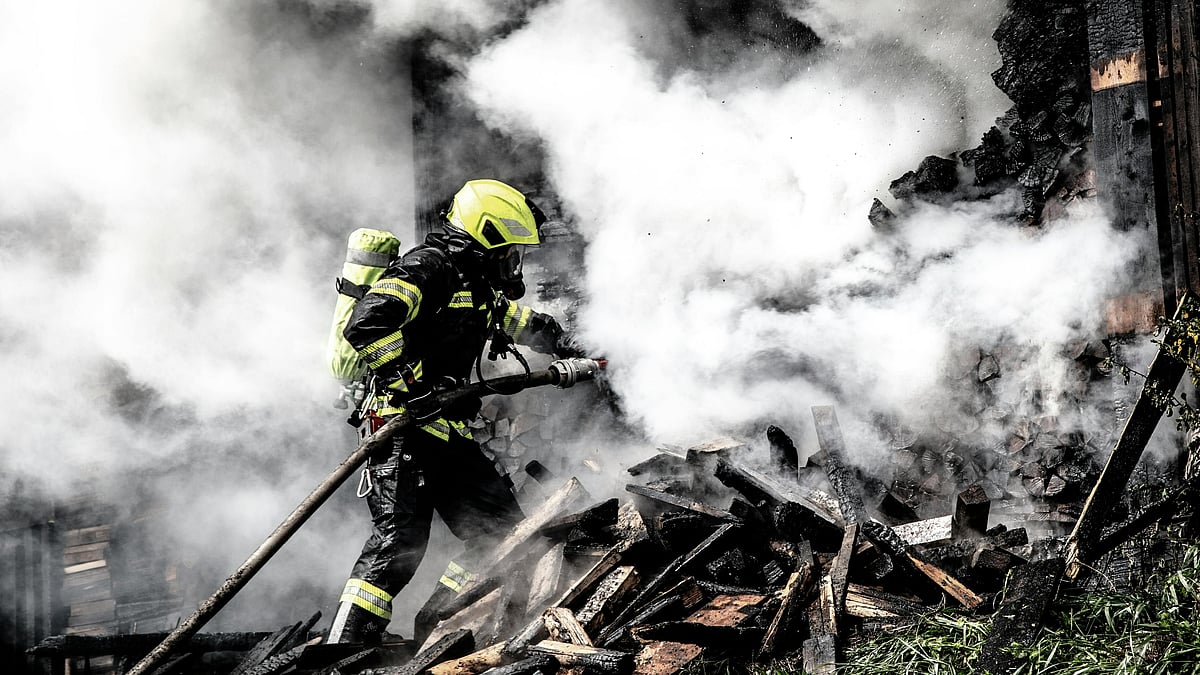 Photo by Francesco Sommacal : Firefighter combats raging wildfire