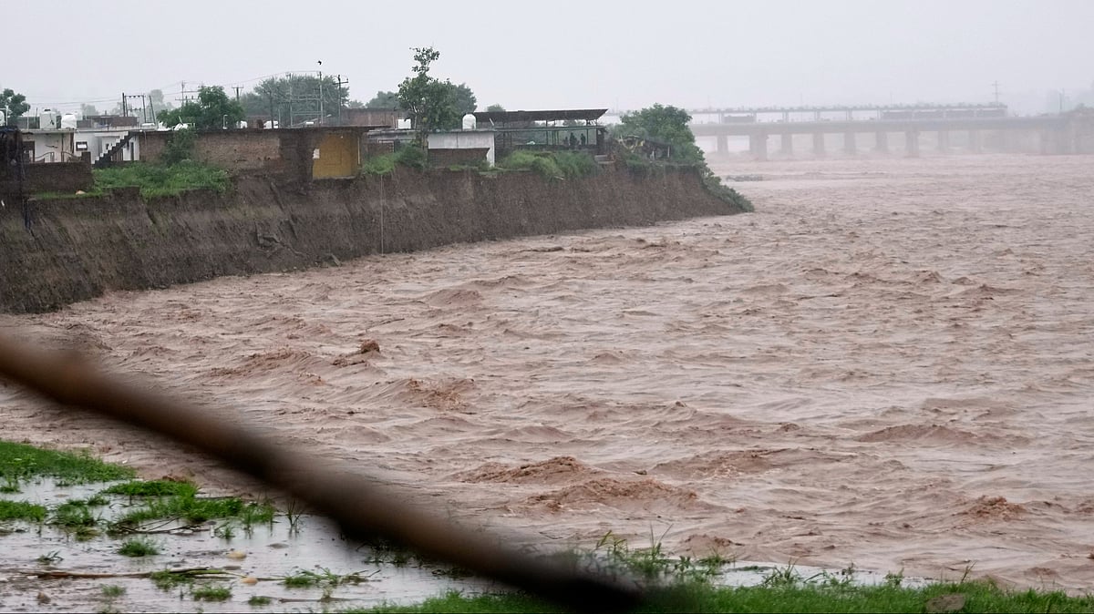 Photo by AP : India warns Pakistan over flooding risks