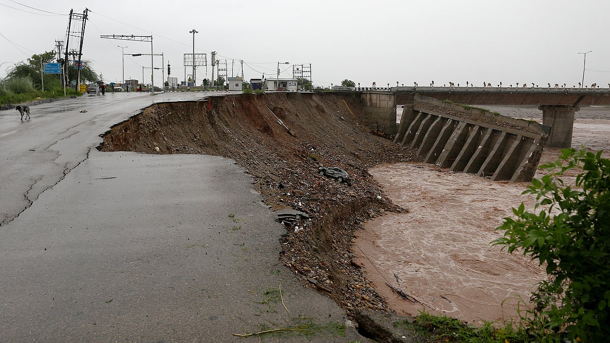 Photo by PTI : Damage caused by heavy rains and landslides in J&K