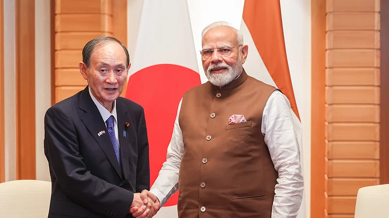 PM Modi And Former Prime Minister Yoshihide Suga - X