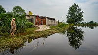 Photo by PTI : Flooded farmlands and submerged homes in Punjab as monsoon rains intensify