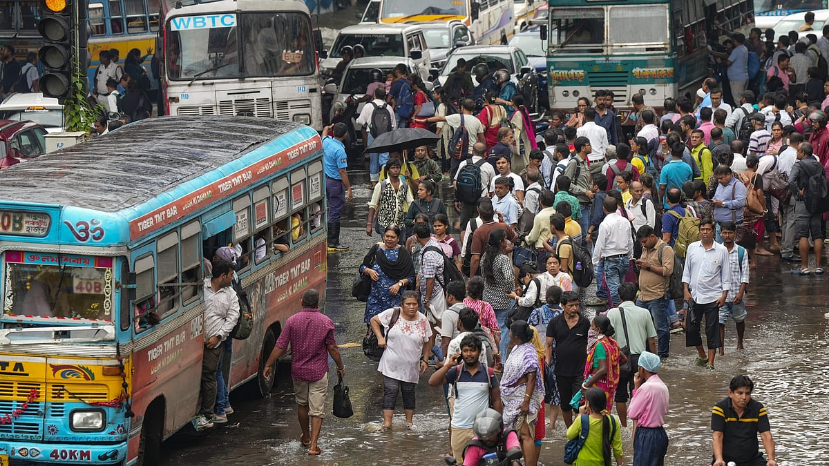 Photo by PTI : Flooded streets in Kolkata after heavy rainfall, disrupting public life and transport
