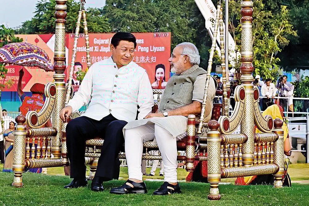 File photo of Xi Jinping and Narendra Modi in Ahmedabad