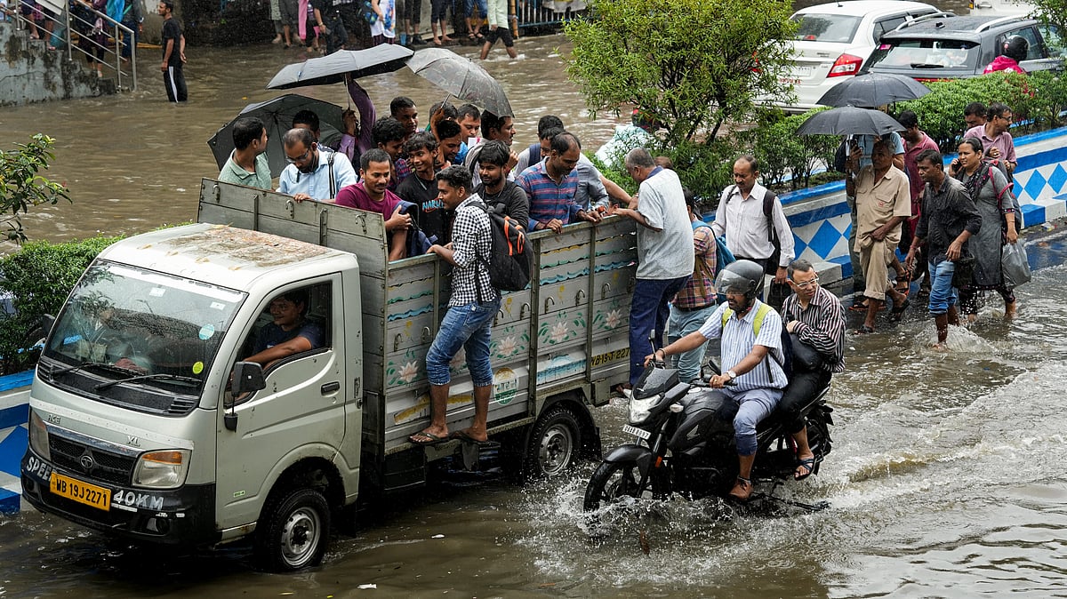 Photo by PTI : Kolkata flooded with record rainfall ahead of Durga Puja, exposing critical infrastructure gaps