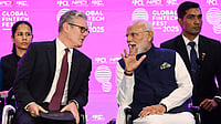 Photo by AP : UK PM Keir Starmer and Prime Minister Narendra Modi