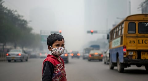 A young child wearing a face mask to protect himself from the pollution