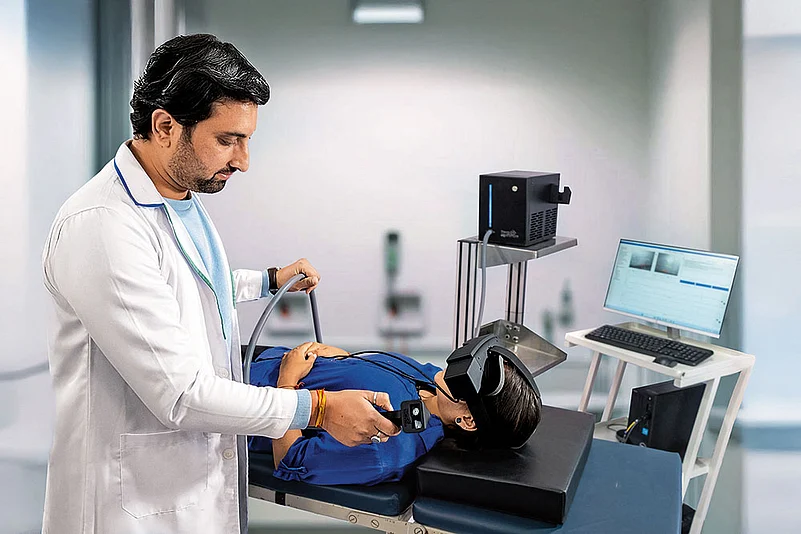 A NeuroEqilibrium doctor demonstrates vertigo and balance-disorder treatment