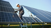MNRE Urges Power Regulator to Delay Stricter Rules for Renewable Energy Producers—Here’s Why Renewable energy infrastructure with solar panels