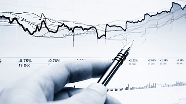 Stock Markets Trade Flat Amid Volatile Trends