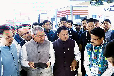 Odisha CM Mohan Charan Majhi, with Union Minister Ashwini Vaishnaw, MoS Jitin Prasada, State E&IT Minister Mukesh Mahalinga, and Principal Secretary- E&IT- Vishal Dev, reviewing a silicon carbide (SiC) wafer at the Odisha Pavilion during Semicon India.