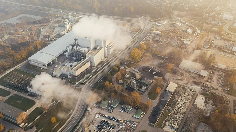 Industrial plant with emissions control infrastructure in operation - Photo by Marcin Jozwiak