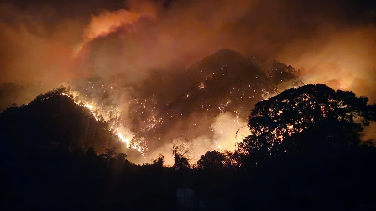 Indian Air Force helicopters are executing sustained aerial firefighting missions above 9,500 ft in the  Lohit valley Arunachal Pradesh. - X/@Indian Air Force