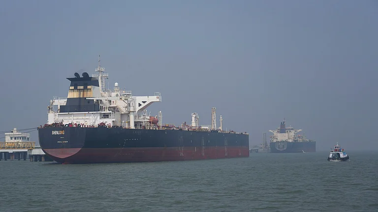Liberia-flagged tanker Shenlong Suezmax, carrying crude oil from Saudi Arabia, that arrived clearing the Strait of Hormuz, is seen at the Mumbai Port in Mumbai, India - Photo by AP