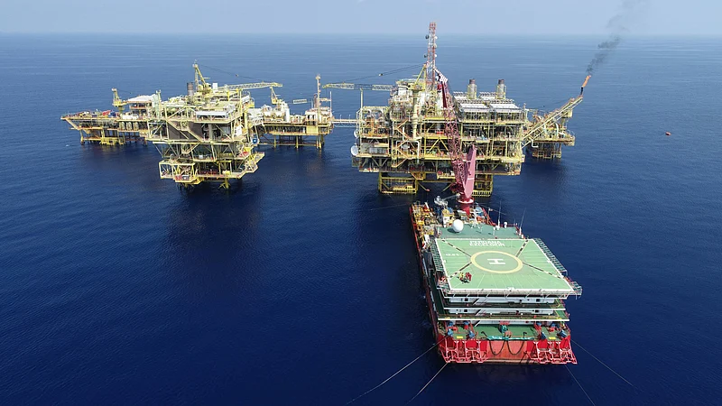 Photo by Aron Razif : Aerial View of Oil Rig out at Sea