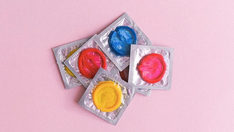 Condom manufacturing and packaging affected by global supply chain disruptions - Photo by Anna Shvets