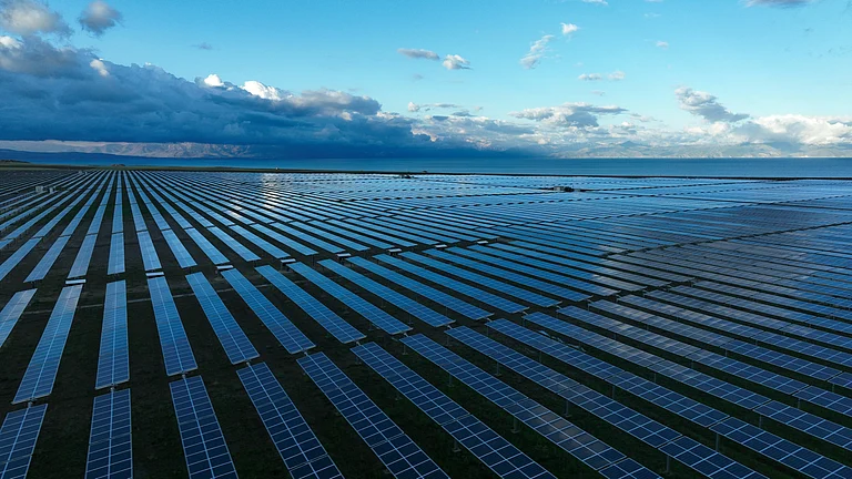 Solar panels and battery storage units powering India’s renewable energy transition - null