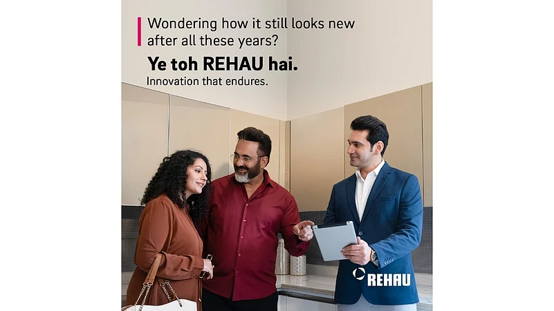 Couple and consultant discussing REHAU kitchen