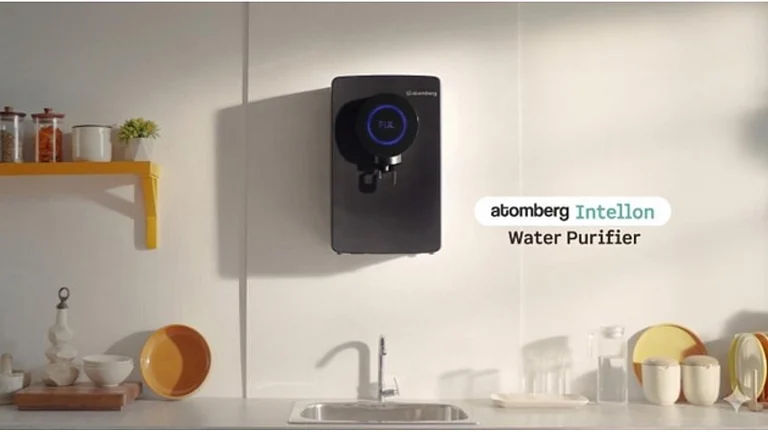 Black Atomberg Intellon water purifier on wall - null