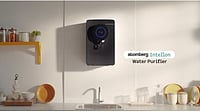 Atomberg’s Intellon Water Purifier Crosses 30,000 Homes, With Adaptive RO Technology Black Atomberg Intellon water purifier on wall