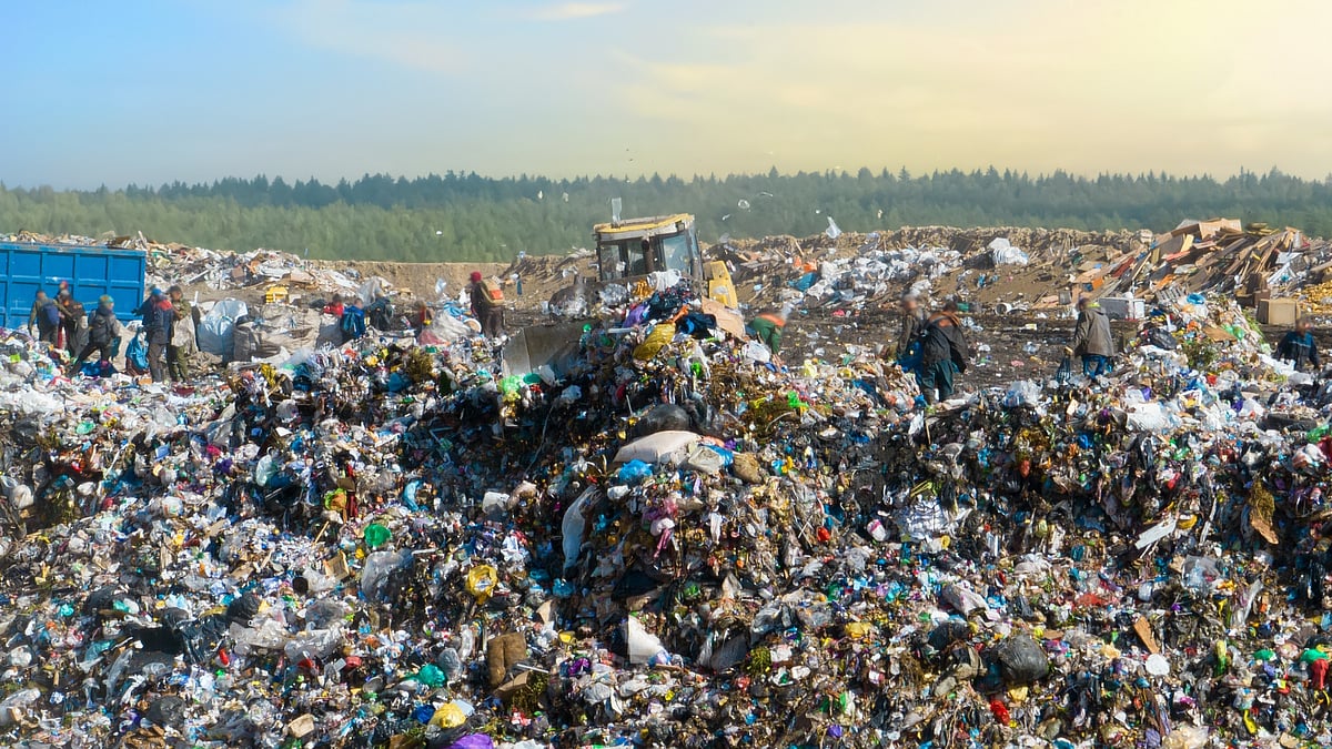 Landfill site emitting methane gas - null