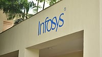 Infosys headquarters in Bengaluru as company announces CEO ESOP grants and pending employee hikes