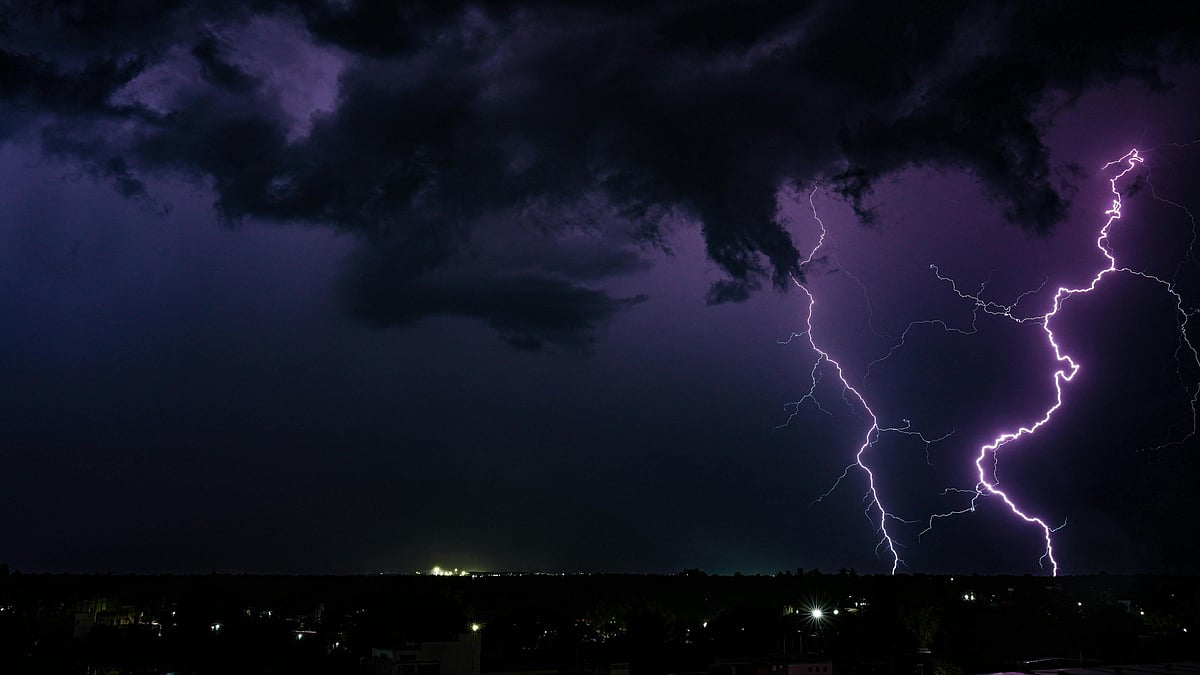 Dark storm clouds build over heat-hit regions - null