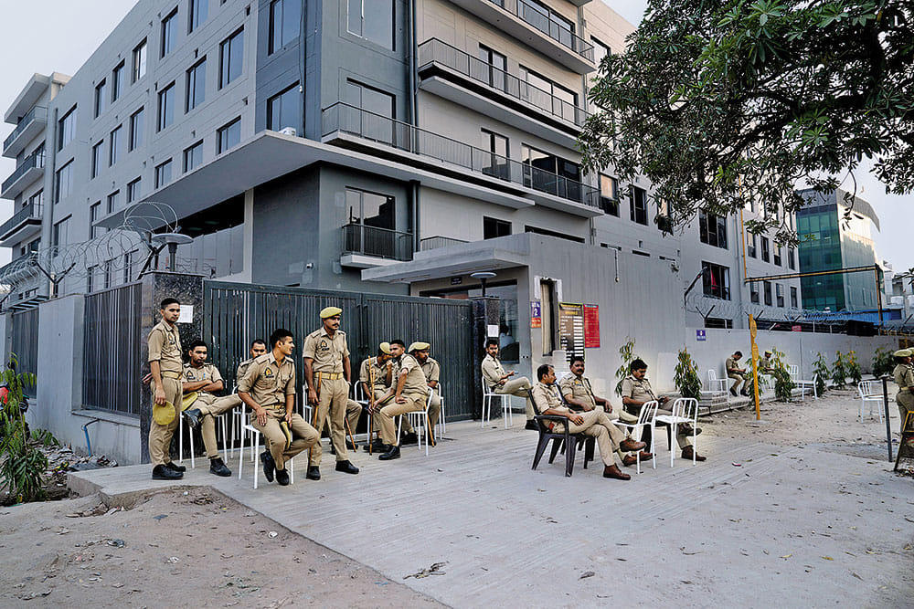 A police team outside a factory