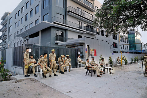 A police team outside a factory
