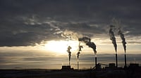Gas flaring at oil and gas facility releasing methane into atmosphere
