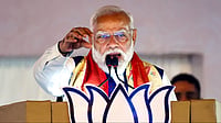 Photo by PTI : Prime Minister Narendra Modi addresses a rally while urging fuel conservation and WFH measures