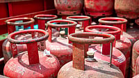 LPG Subsidy Rules 2026: Who May Lose Benefits after New Verification Drive Domestic LPG cylinders stacked outside a distribution centre amid subsidy verification checks in India