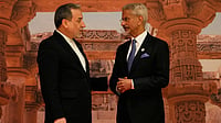 Photo by AP : India's Foreign Minister S. Jaishankar, right, speaks with Iranian Foreign Minister Abbas Araghchi as he arrives for a two-day BRICS nations meeting in New Delhi, India