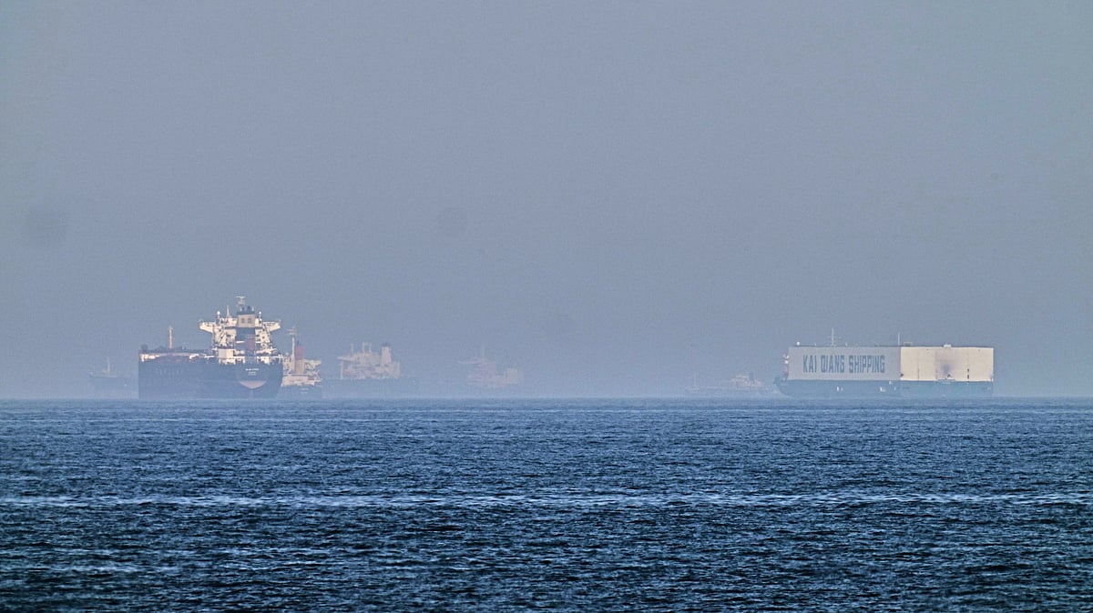 Oil tankers navigating the Strait of Hormuz with global energy flows highlighted - Photo by AP