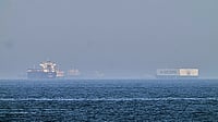 Photo by AP : Oil tankers navigating the Strait of Hormuz with global energy flows highlighted