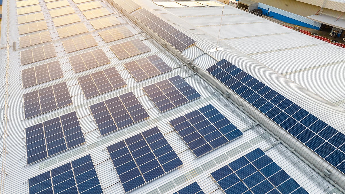 Solar panels at a renewable energy project site in India - null