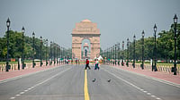 People shielding themselves from extreme heat during hot summer conditions in Delhi