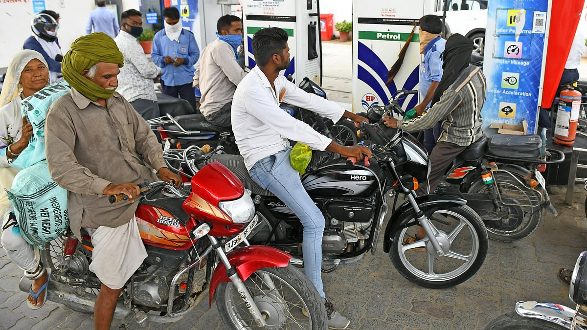 Vehicles lined up at a petrol station amid concerns over potential fuel supply disruptions - null