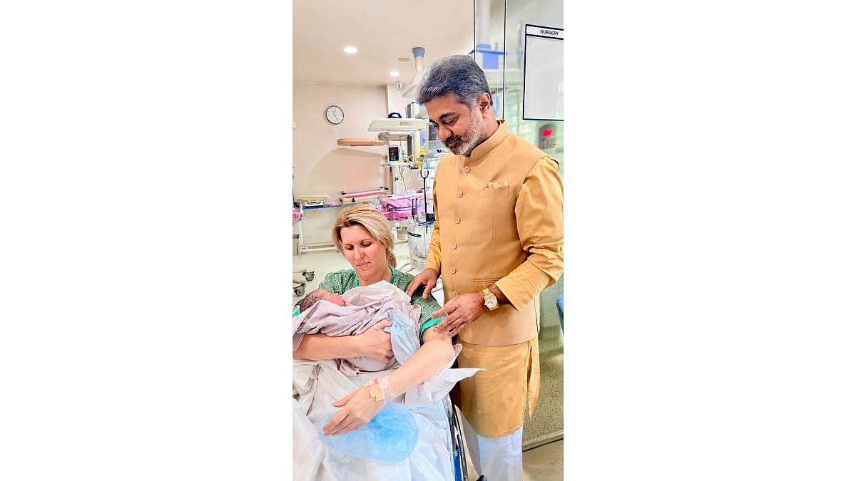 Dr. Abhishek and Anca Verma with their baby boy - null