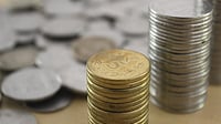 Indian rupee coins stacked