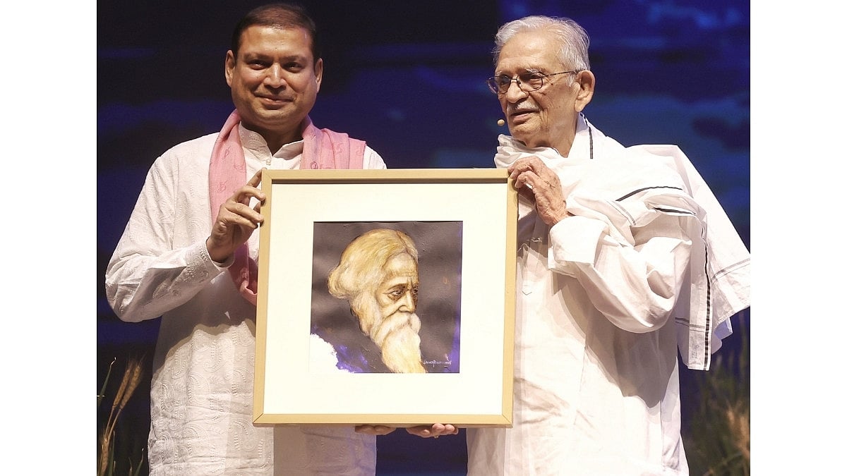 Mr. Sundeep Bhutoria, culturist, presenting a Suvaprasanna-painting of Kavi Guru Rabindranath Tagore to Gulzar during World Music Day 2026 in Kolkata - null