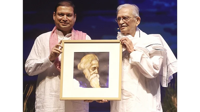 Mr. Sundeep Bhutoria, culturist, presenting a Suvaprasanna-painting of Kavi Guru Rabindranath Tagore to Gulzar during World Music Day 2026 in Kolkata - null