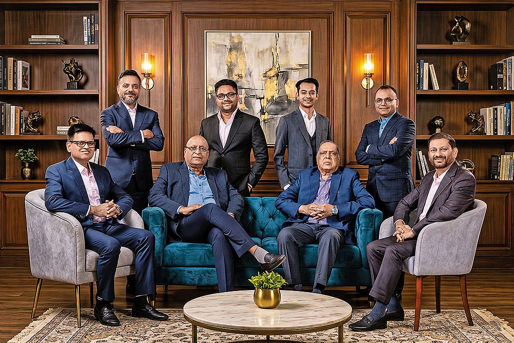 Generations of Excellence. (Standing, L-R) Mr. Avinash, Mr. Yash, Mr. Aditya & Mr. Priyank Singhania. (Seated, L-R) Mr. Mukesh, Mr. Arun, Mr. Naresh & Anand Singhania.