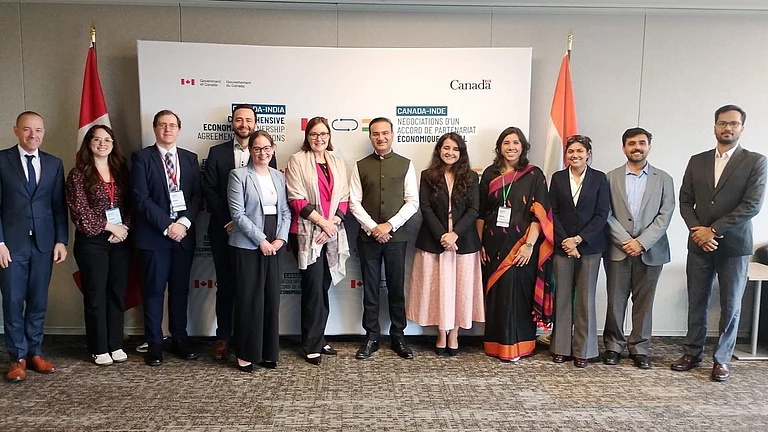 India, Canada Conclude Third Round of Talks on Proposed Trade Pact - X