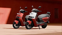 Two red and white Ather Rizta electric scooters