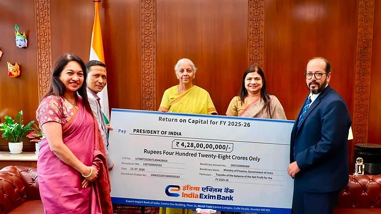 Ms. Harsha Bangari, Managing Director, accompanied by Mr. Tarun Sharma and Ms. Deepali Agrawal, Deputy Managing Directors, Exim Bank, presenting the receipt for transfer of the balance of net profit amounting to ₹428 crore to Smt. Nirmala Sitharaman, Hon’ble Minister of Finance and Corporate Affairs, Government of India, in the presence of Shri Dr Abhijit Phukon, Economic Adviser, Department of Financial Services, Ministry of Finance, Government of India. - null